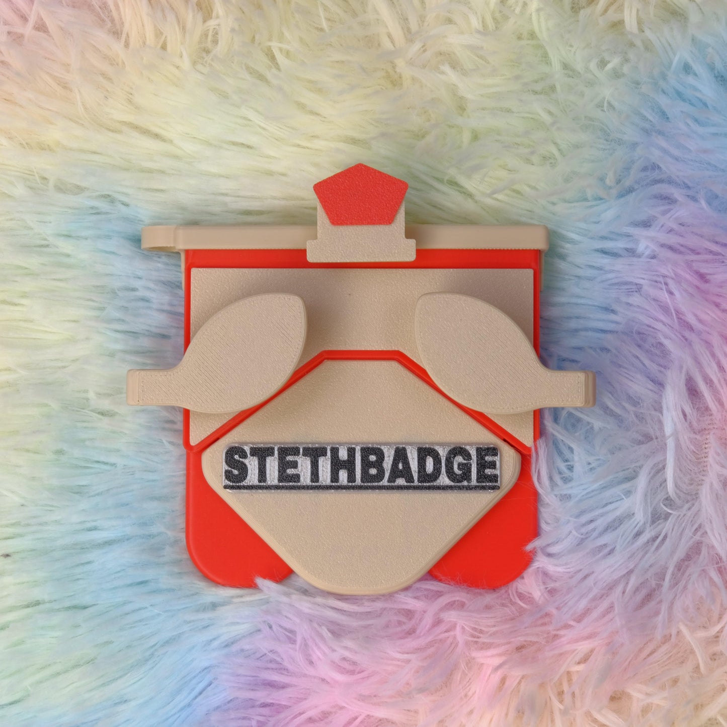 Beige and Pop Red-colored Stethoscope Holder or Nurse tool or Nurse accessory for nurses called Stethbadge.