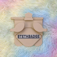 Beige-colored Stethoscope Holder or Nurse tool or Nurse accessory for nurses called Stethbadge.