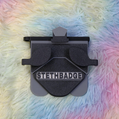 Black and Grey-colored Stethoscope Holder or Nurse tool or Nurse accessory for nurses called Stethbadge.