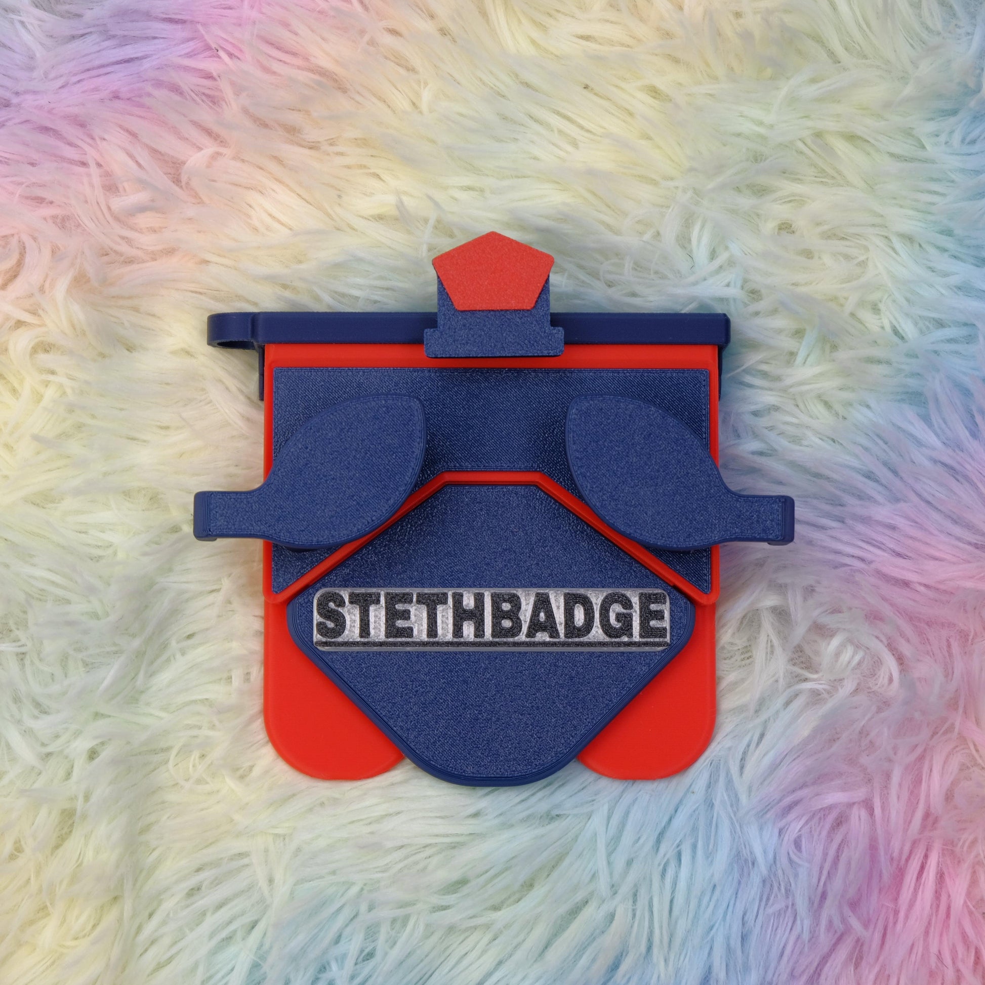 Navy Blue and Pop Red-colored Stethoscope Holder or Nurse tool or Nurse accessory for nurses called Stethbadge.