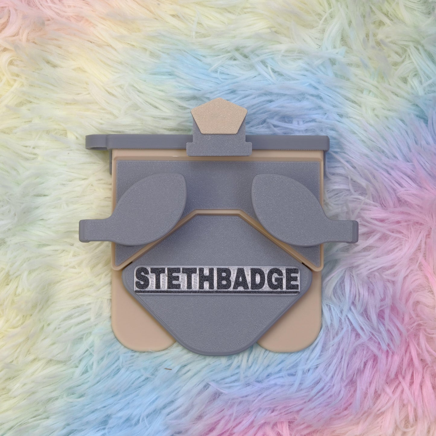 Grey and Beige-colored Stethoscope Holder or Nurse tool or Nurse accessory for nurses called Stethbadge.
