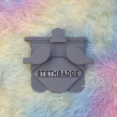 Grey-colored Stethoscope Holder or Nurse tool or Nurse accessory for nurses called Stethbadge.