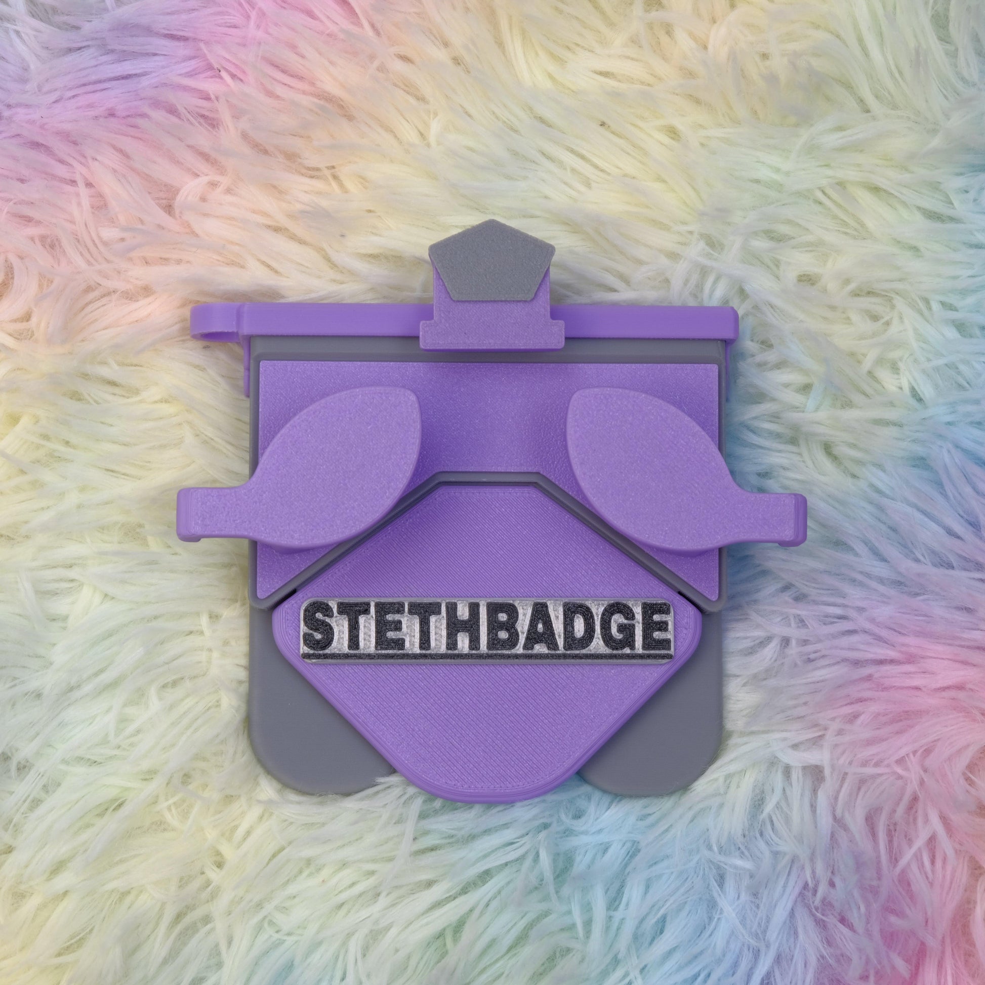 Purple/Lavender and Grey-colored Stethoscope Holder or Nurse tool or Nurse accessory for nurses called Stethbadge.