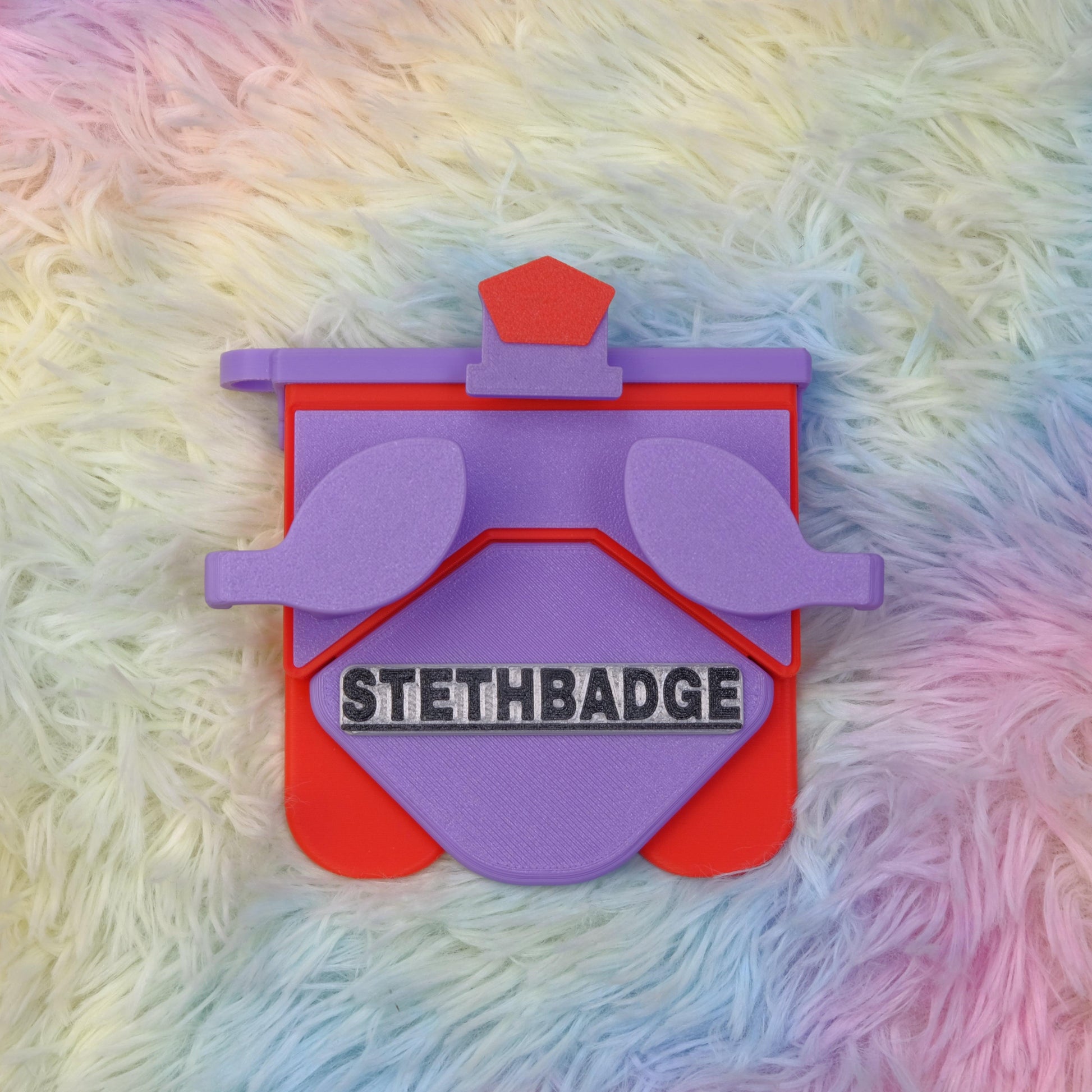 Purple Lavender and Pop Red-colored Stethoscope Holder or Nurse tool or Nurse accessory for nurses called Stethbadge.