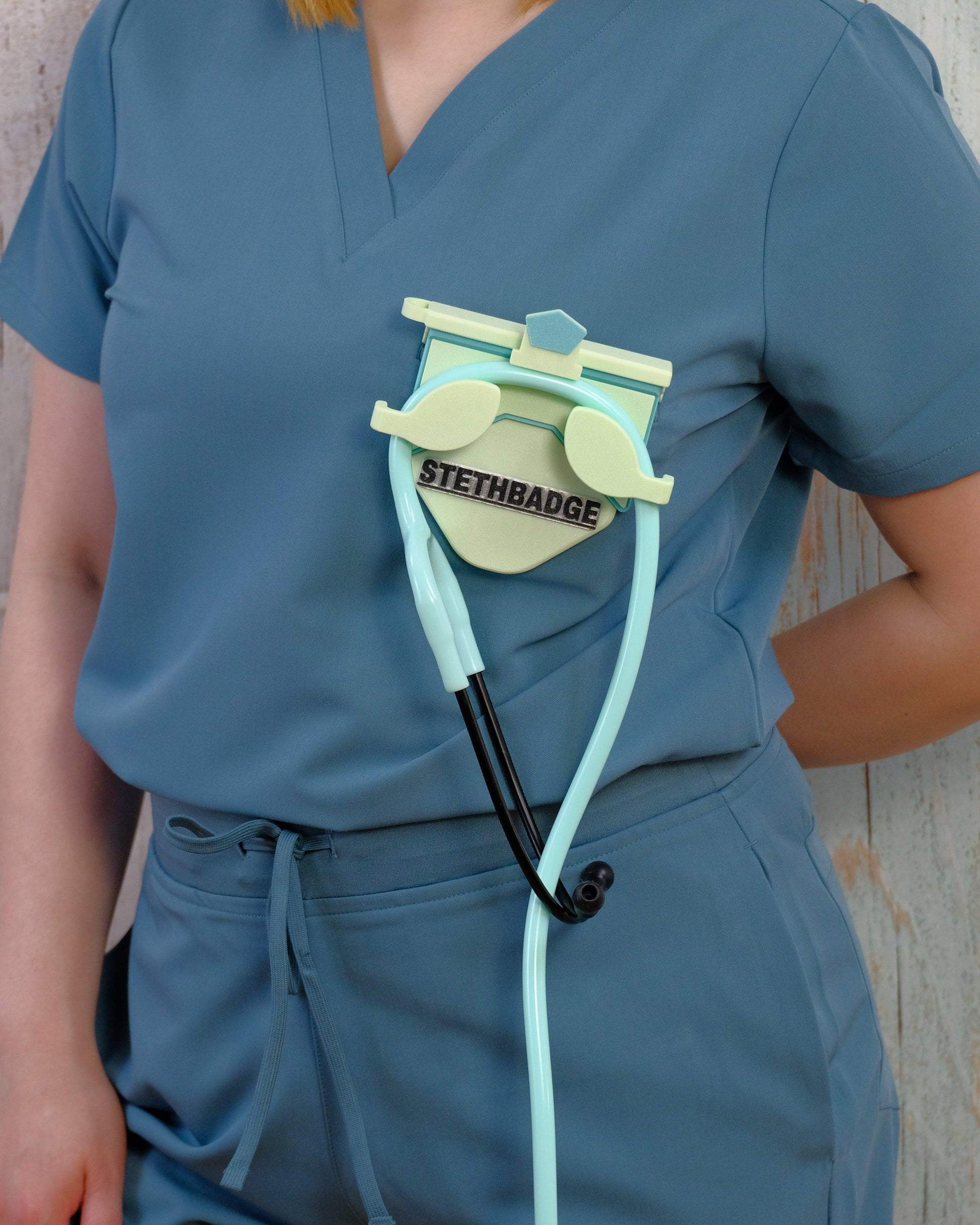 Teal-colored Stethoscope Holder or Nurse tool or Nurse accessory for nurses called Stethbadge.