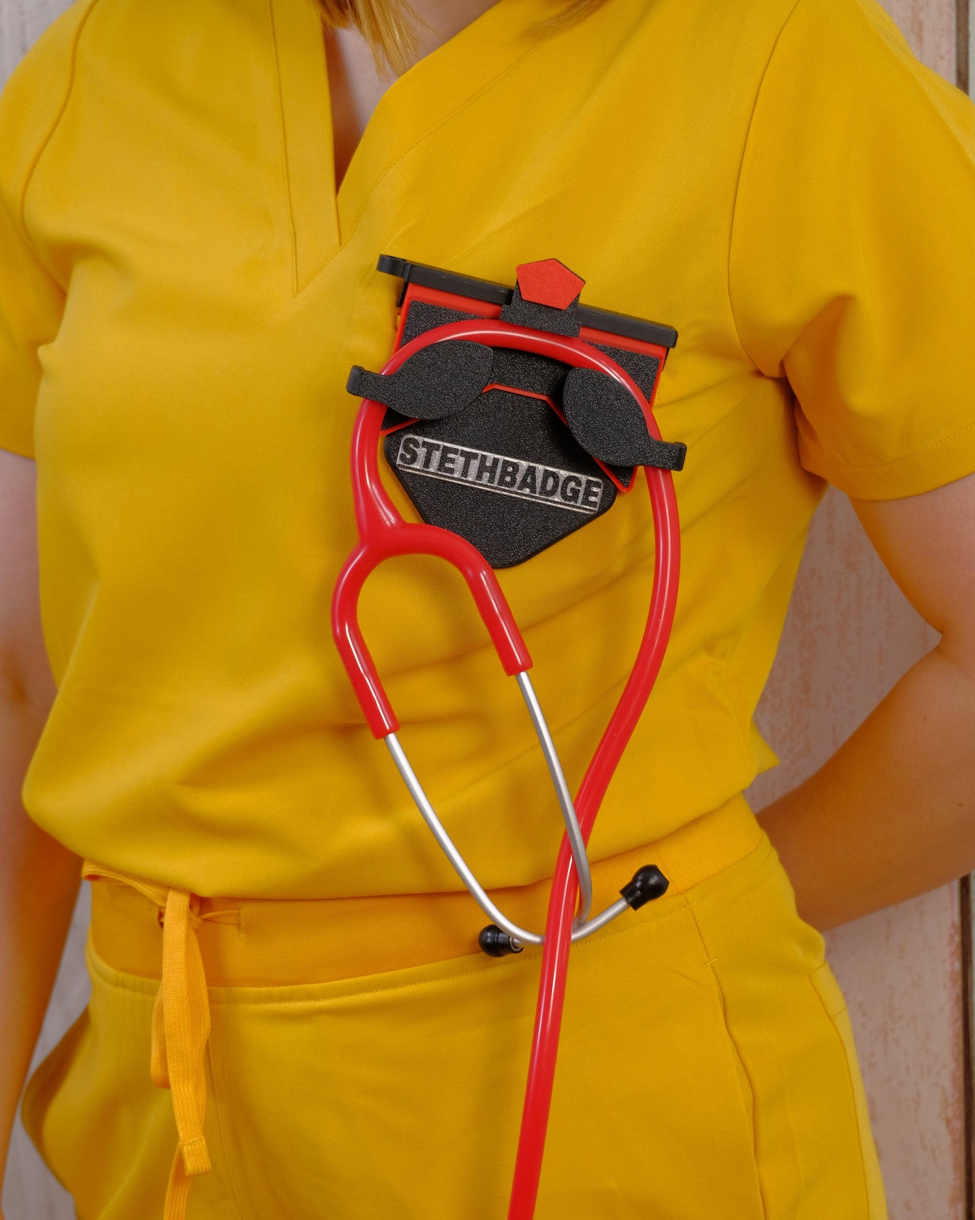 Pop Red-colored Stethoscope Holder or Nurse tool or Nurse accessory for nurses called Stethbadge.