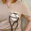Beige-colored Stethoscope Holder or Nurse tool or Nurse accessory for nurses called Stethbadge.