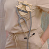 Beige-colored Stethoscope Holder or Nurse tool or Nurse accessory for nurses called Stethbadge.