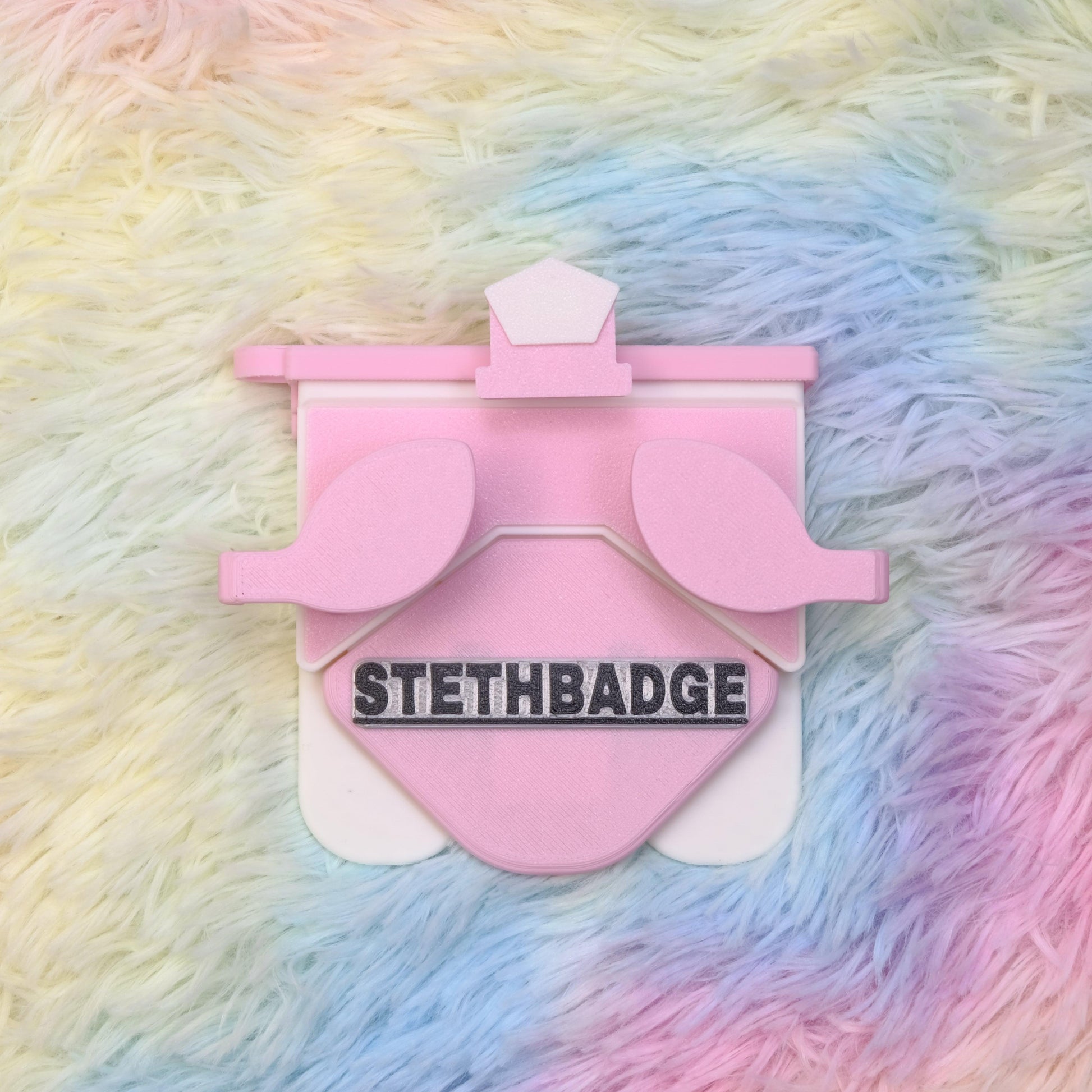 Chalk Pink and White-colored Stethoscope Holder or Nurse tool or Nurse accessory for nurses called Stethbadge.