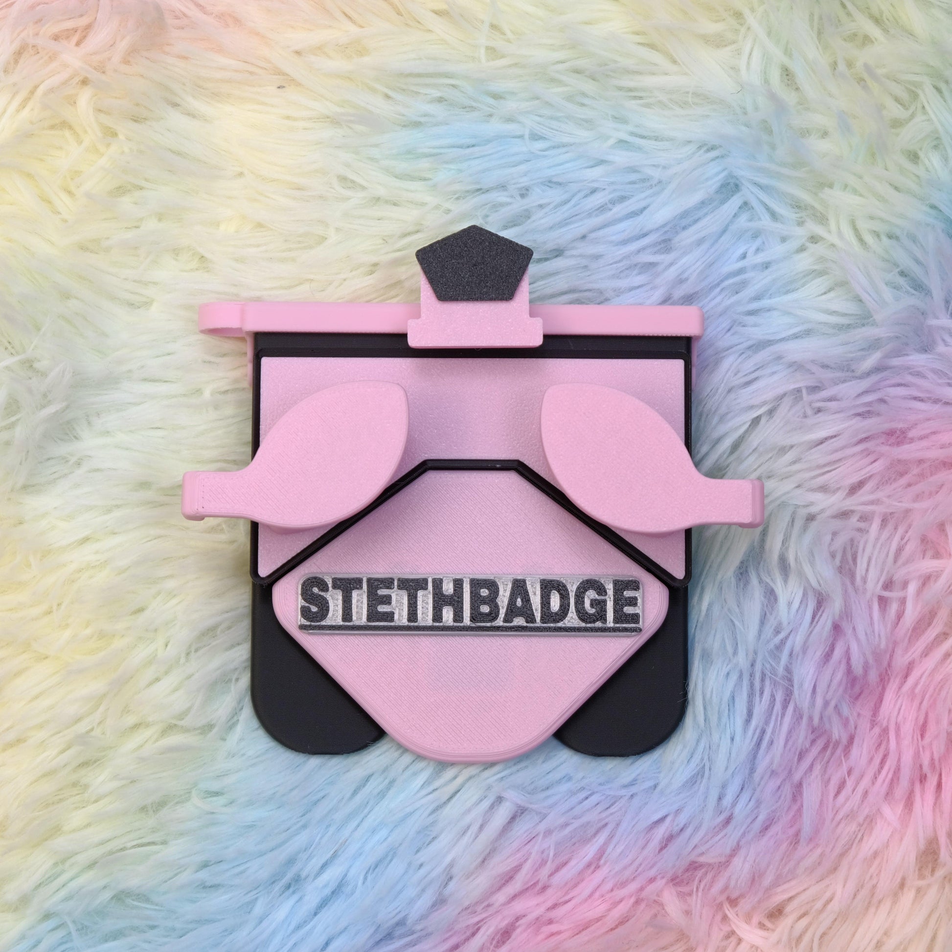 Chalk Pink and Black-colored Stethoscope Holder or Nurse tool or Nurse accessory for nurses called Stethbadge.