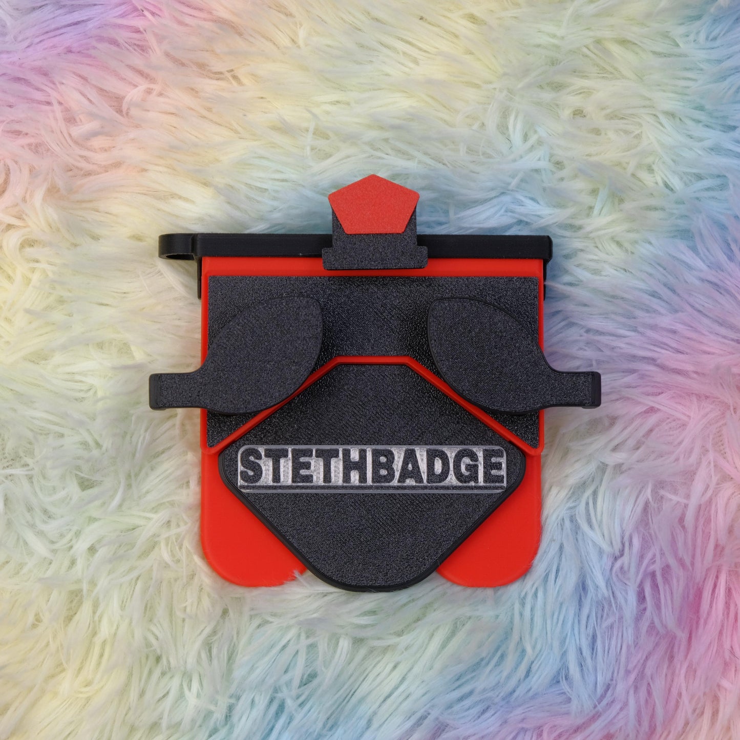 Black and Pop Red-colored Stethoscope Holder or Nurse tool or Nurse accessory for nurses called Stethbadge.