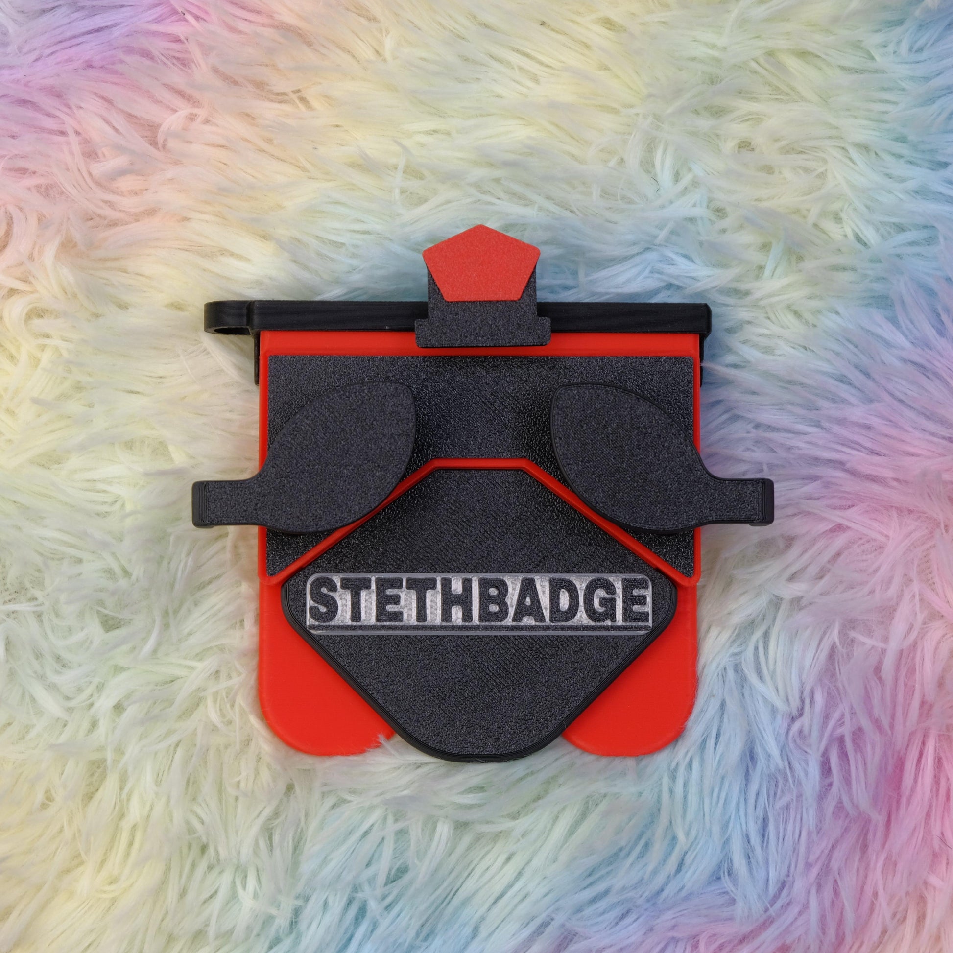 Black and Pop Red-colored Stethoscope Holder or Nurse tool or Nurse accessory for nurses called Stethbadge.