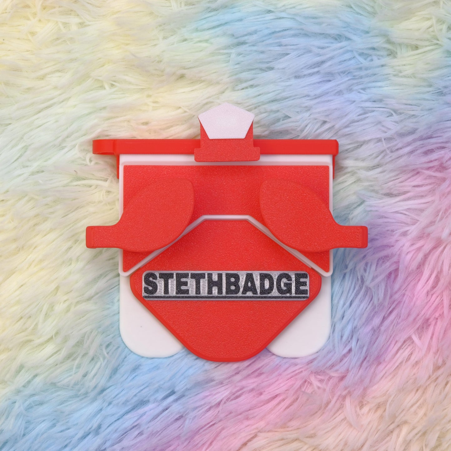 Red and White-colored Stethoscope Holder or Nurse tool or Nurse accessory for nurses called Stethbadge.