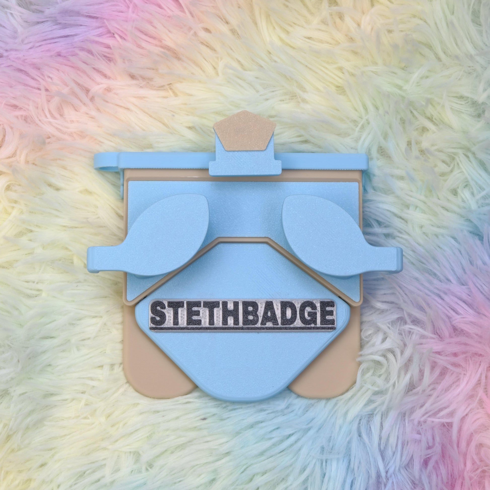 Sky Blue and Beige-colored Stethoscope Holder or Nurse tool or Nurse accessory for nurses called Stethbadge.