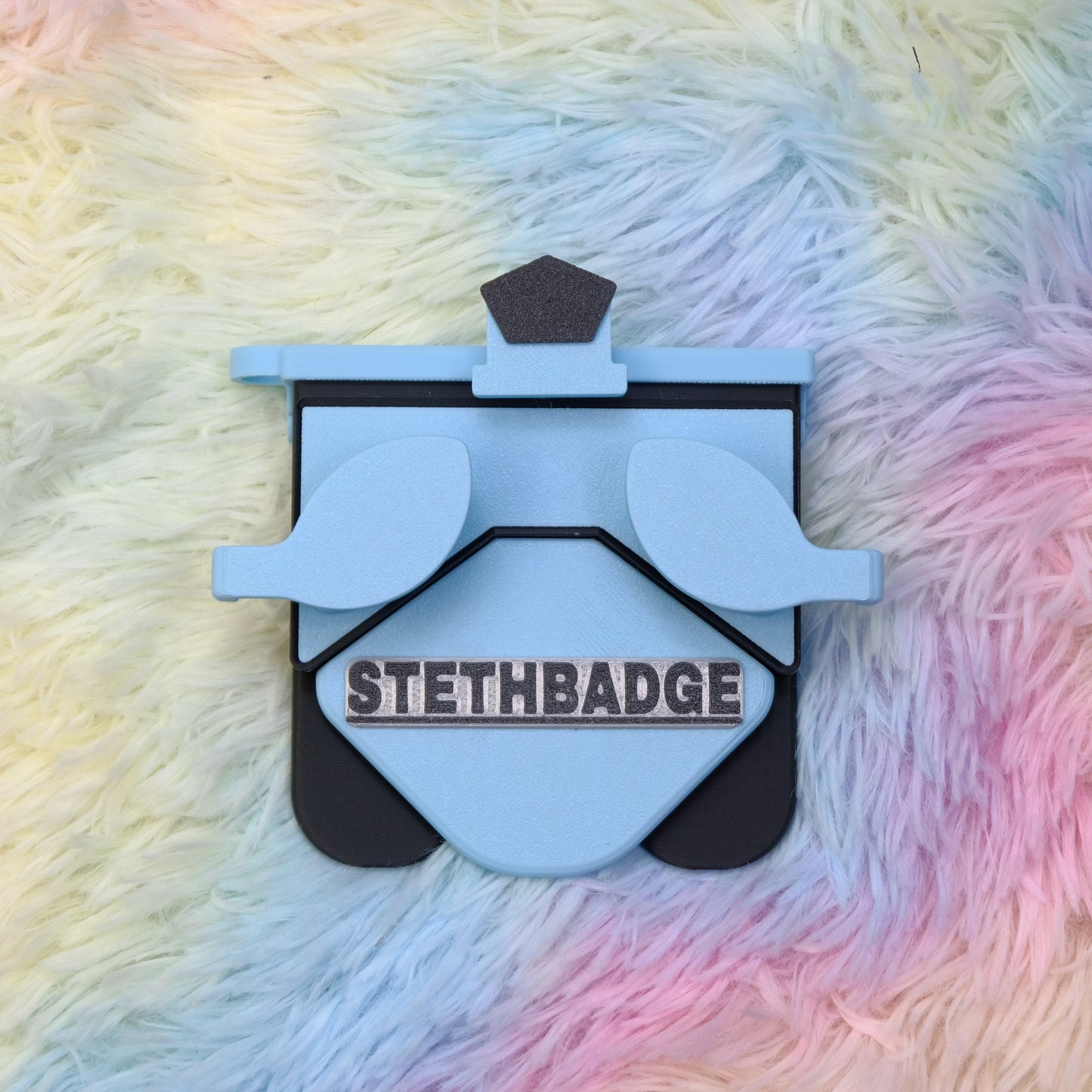 Sky Blue and Black-colored Stethoscope Holder or Nurse tool or Nurse accessory for nurses called Stethbadge.
