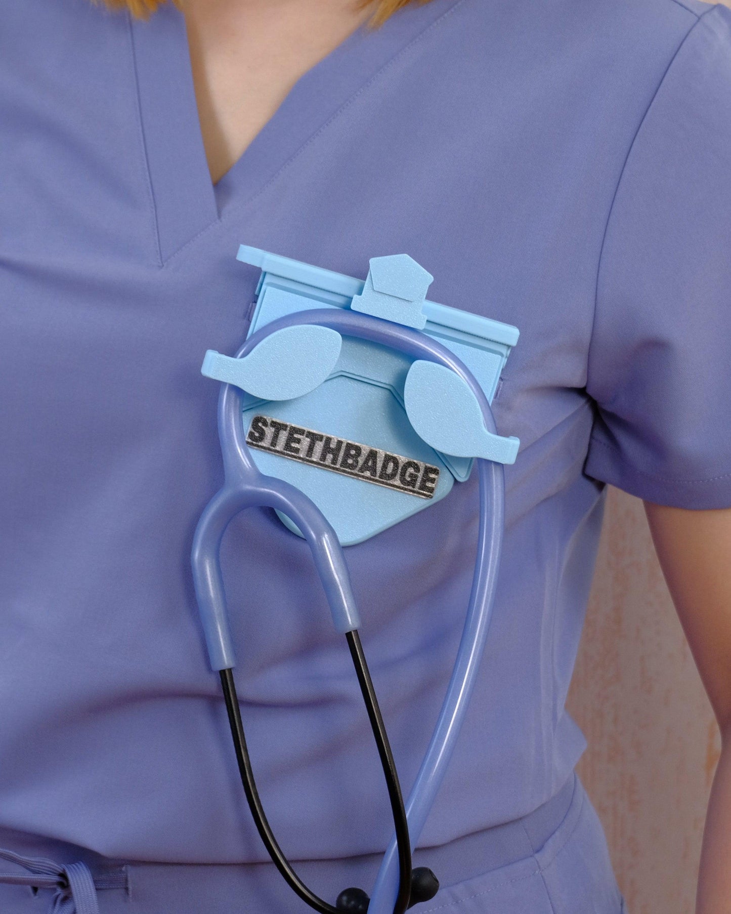 Wearable Sky Blue-colored Stethoscope Holder or Nurse tool or Nurse accessory for nurses called Stethbadge.