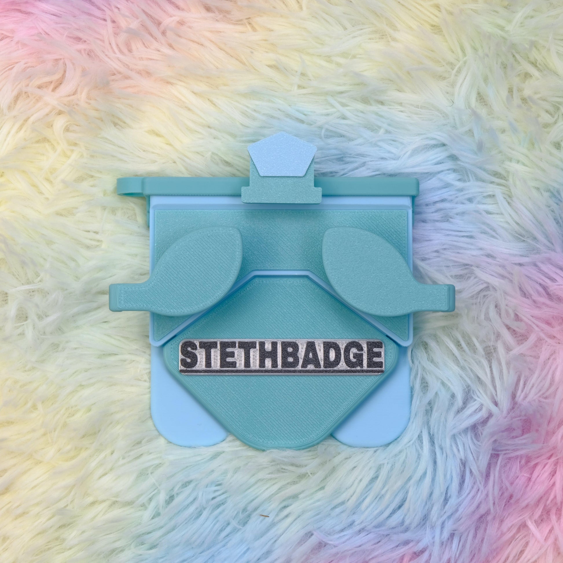 Teal Green and Sky Blue-colored Stethoscope Holder or Nurse tool or Nurse accessory for nurses called Stethbadge.