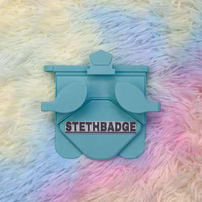 Teal-colored Stethoscope Holder or Nurse tool or Nurse accessory for nurses called Stethbadge.