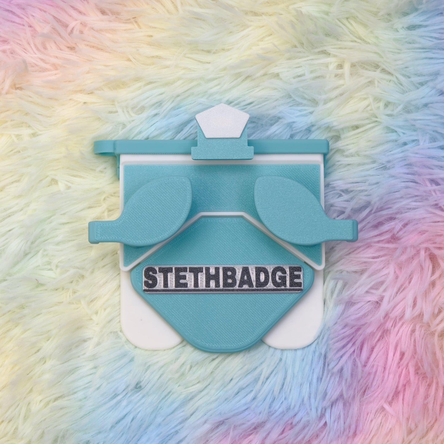 Teal Green and White-colored Stethoscope Holder or Nurse tool or Nurse accessory for nurses called Stethbadge.