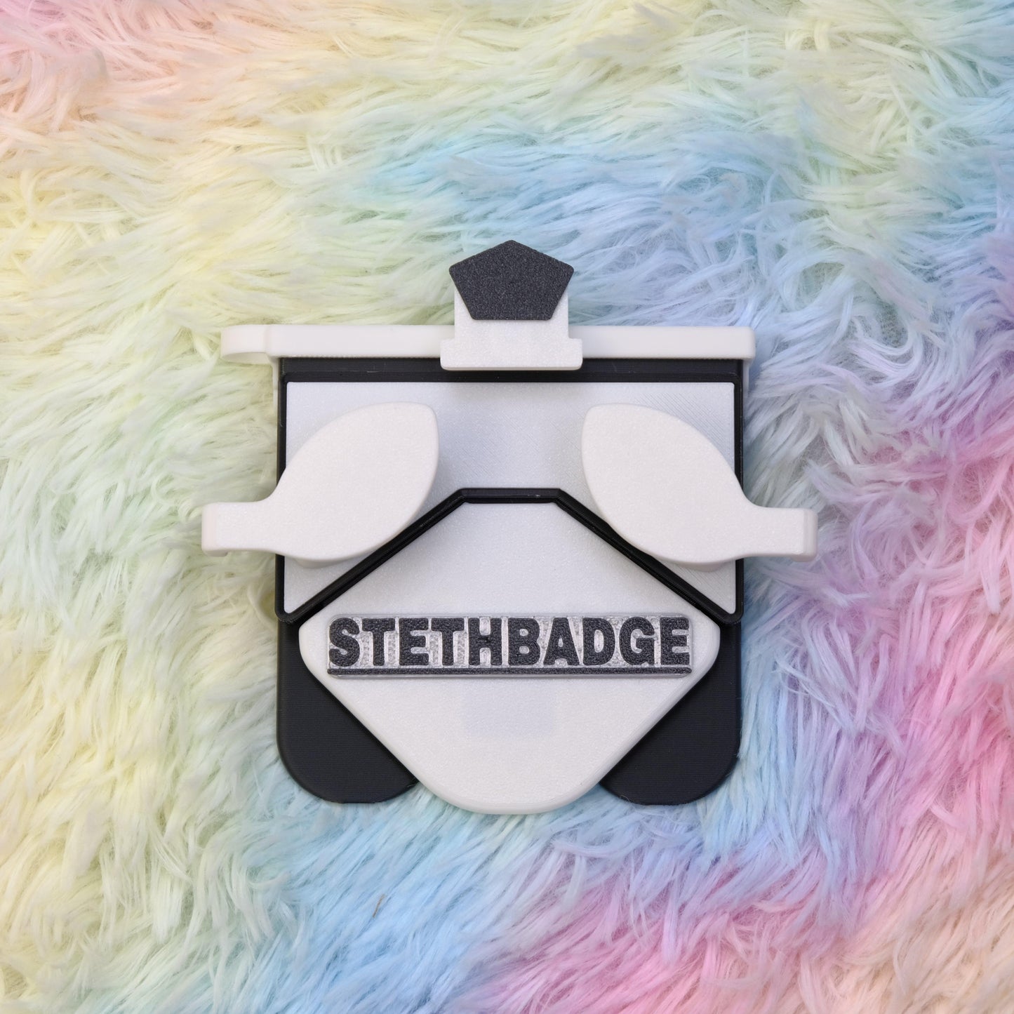 White and Black-colored Stethoscope Holder or Nurse tool or Nurse accessory for nurses called Stethbadge.