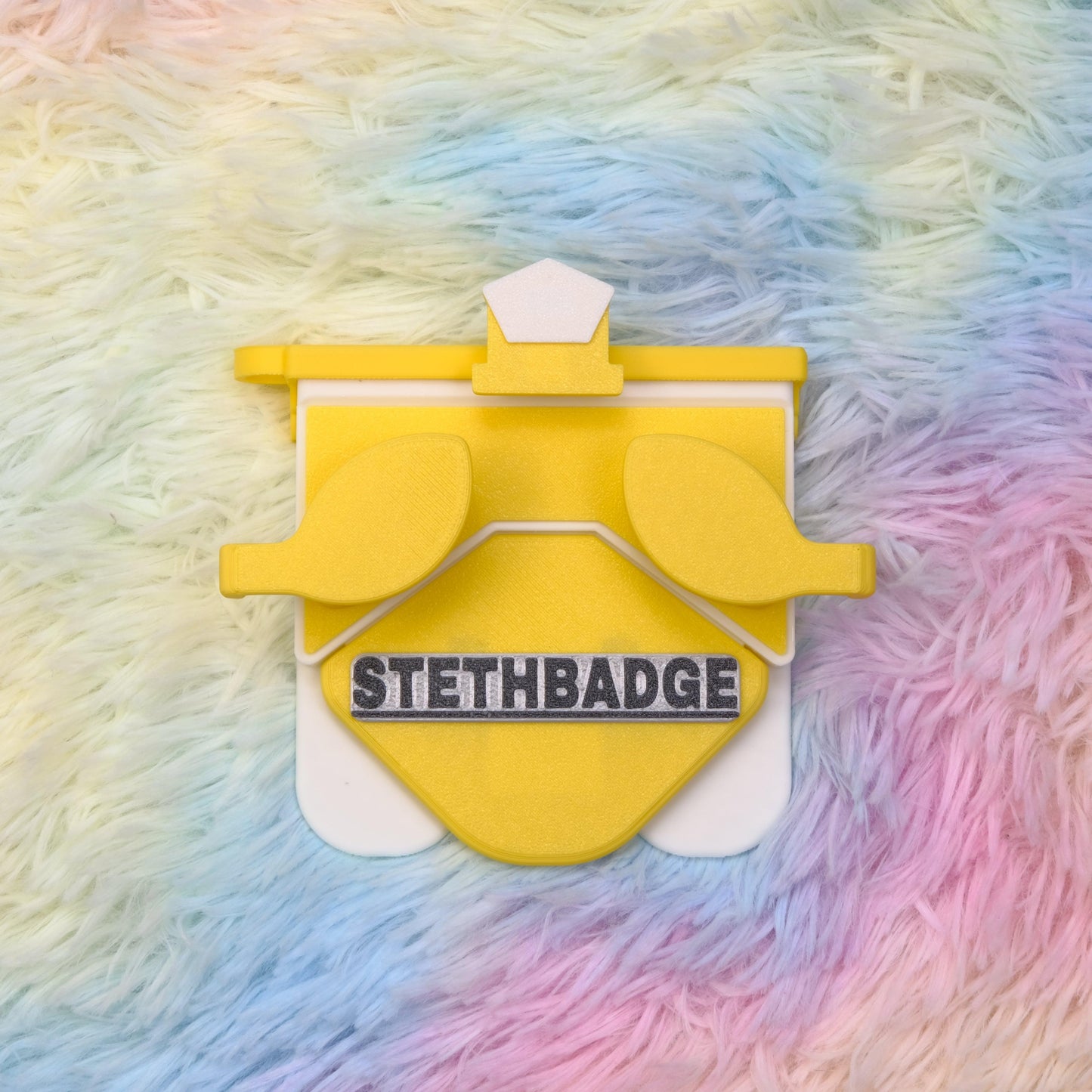Yellow and White-colored Stethoscope Holder or Nurse tool or Nurse accessory for nurses called Stethbadge.