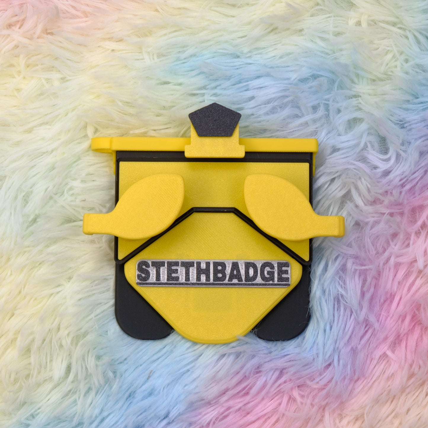 Yellow and Black-colored Stethoscope Holder or Nurse tool or Nurse accessory for nurses called Stethbadge.