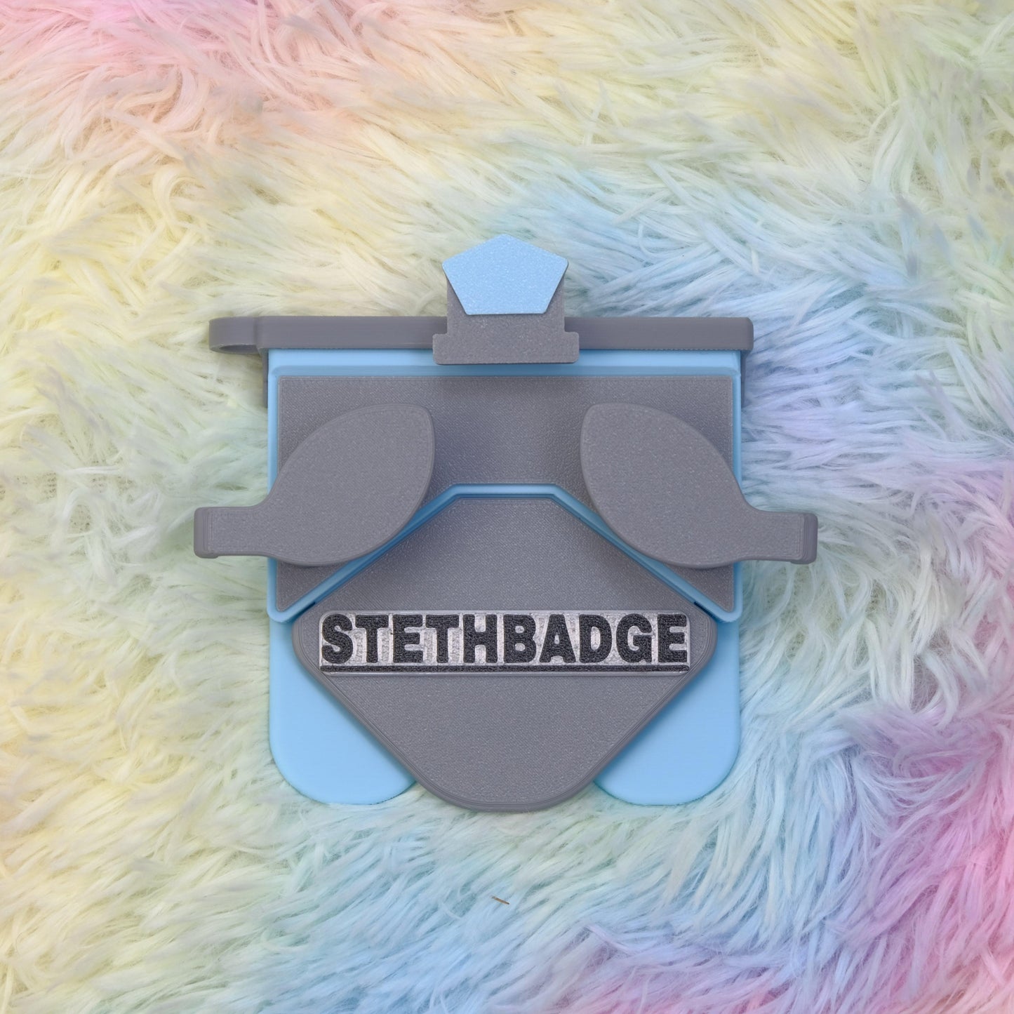 Grey and Sky Blue-colored Stethoscope Holder or Nurse tool or Nurse accessory for nurses called Stethbadge.
