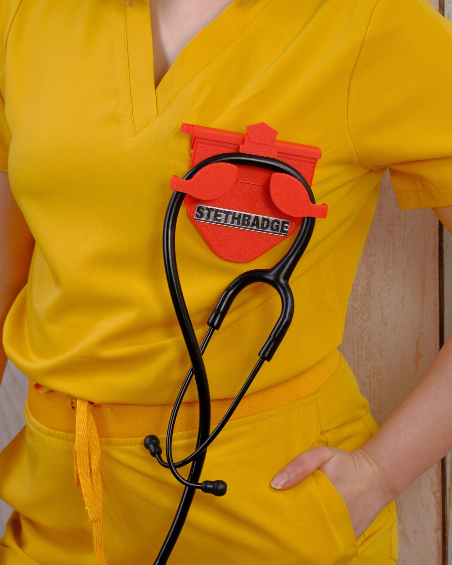 Pop Red-colored Stethoscope Holder or Nurse tool or Nurse accessory for nurses called Stethbadge.