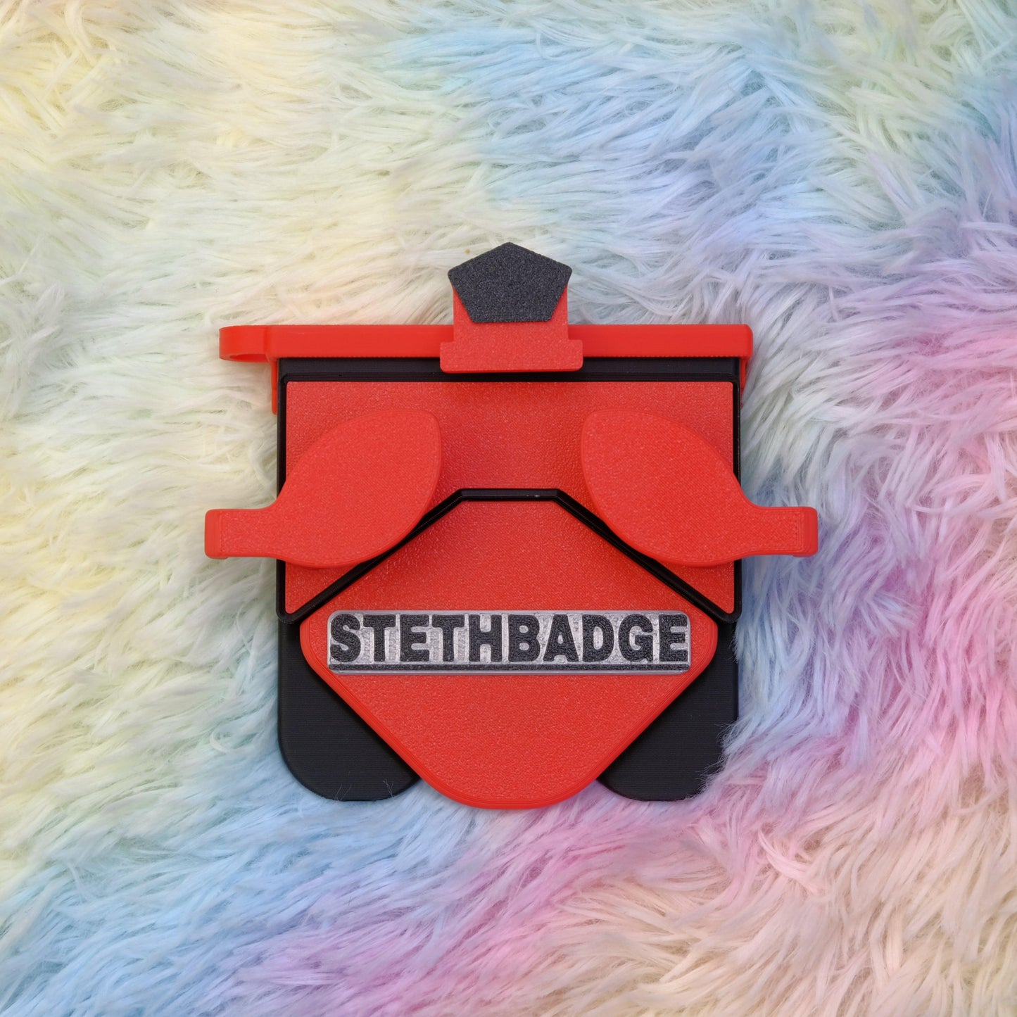 Red and Black-colored Stethoscope Holder or Nurse tool or Nurse accessory for nurses called Stethbadge.