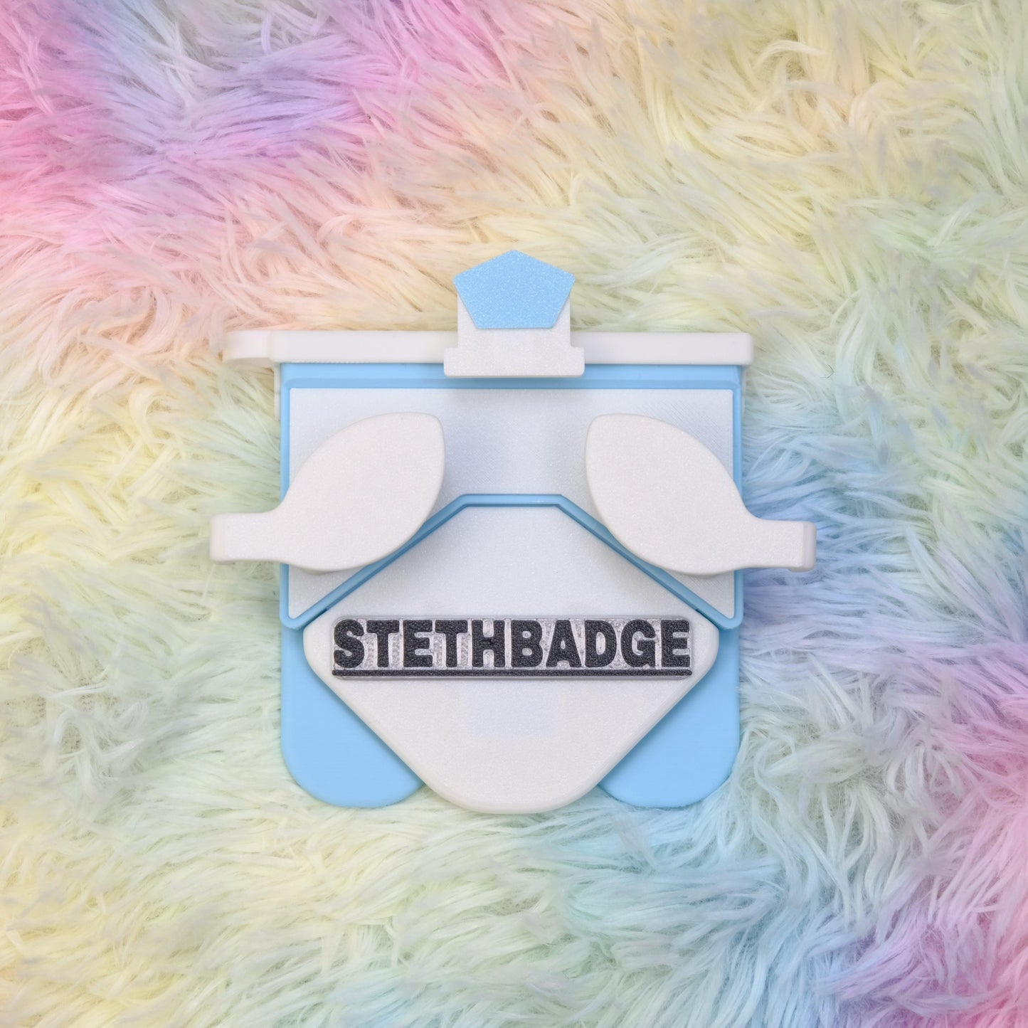 White and Sky Blue-colored Stethoscope Holder or Nurse tool or Nurse accessory for nurses called Stethbadge.