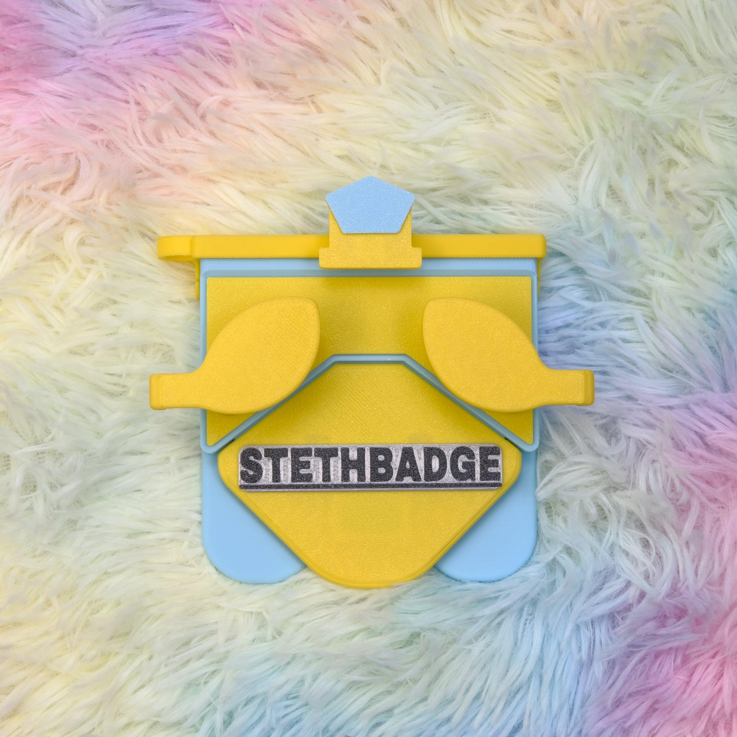 Yellow and Sky Blue-colored Stethoscope Holder or Nurse tool or Nurse accessory for nurses called Stethbadge.
